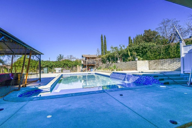 view of swimming pool with a fenced backyard, a fenced in pool, and a patio