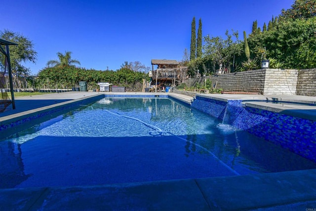 view of pool featuring fence and a fenced in pool