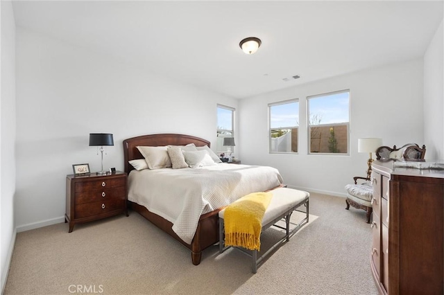 bedroom with light carpet