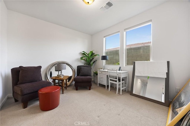 living area featuring carpet flooring