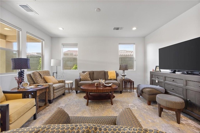 living room featuring a healthy amount of sunlight