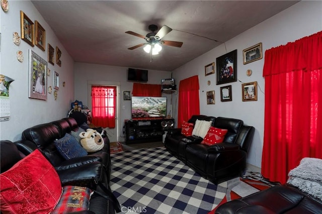 living room featuring ceiling fan