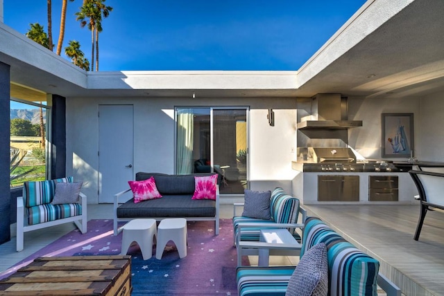 view of patio with area for grilling and an outdoor living space