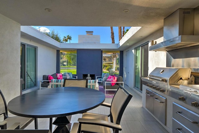 view of patio featuring exterior kitchen