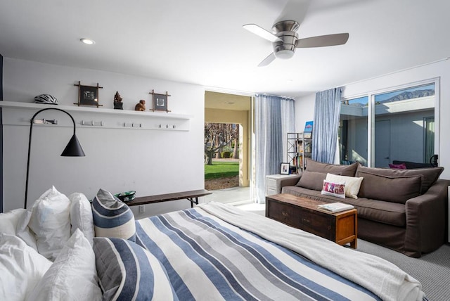 bedroom with ceiling fan and carpet floors