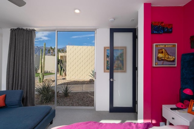 bedroom featuring light colored carpet