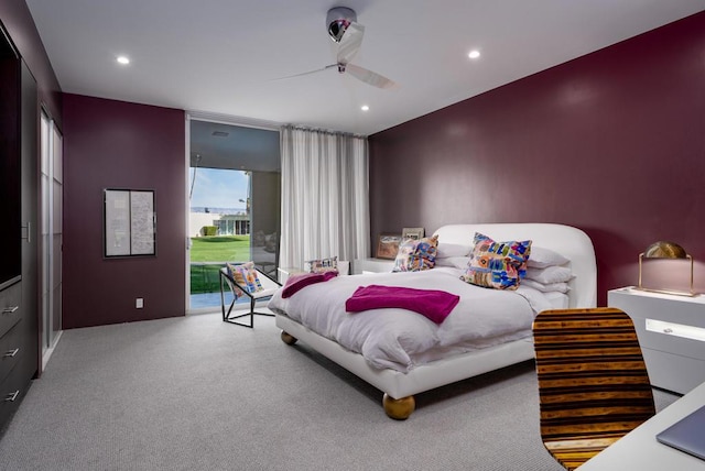 carpeted bedroom with access to exterior and ceiling fan