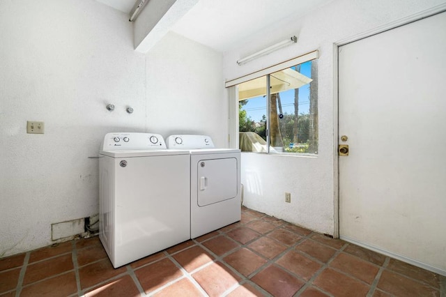 laundry area featuring washer and clothes dryer