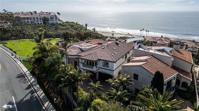 aerial view featuring a water view and a beach view