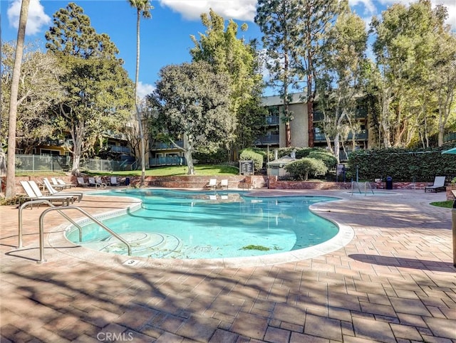 view of swimming pool featuring a patio