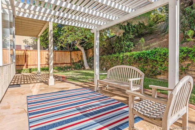 view of patio featuring a pergola