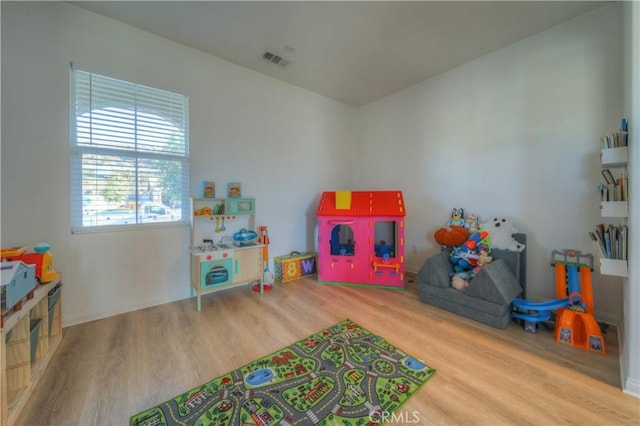 rec room featuring hardwood / wood-style floors