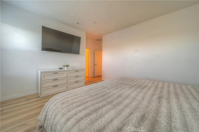 bedroom featuring light hardwood / wood-style flooring