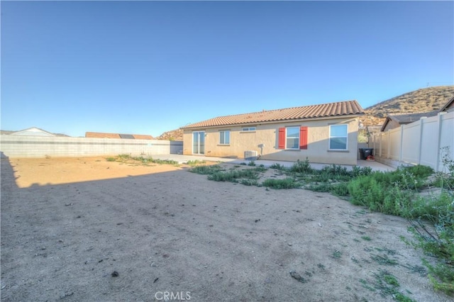 rear view of house with a patio area