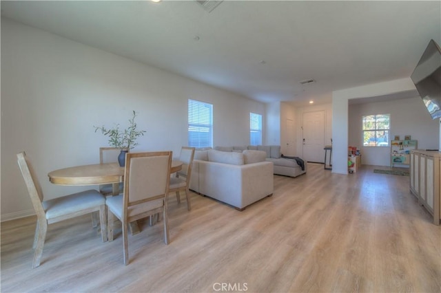 dining room featuring light wood-type flooring