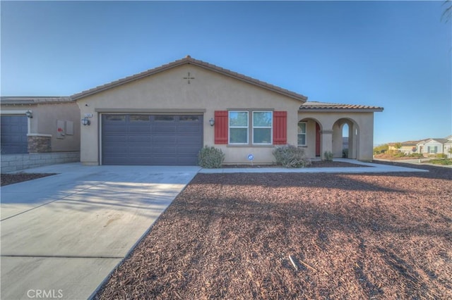 view of front of home with a garage