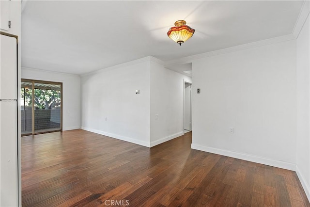 interior space with ornamental molding and dark wood-type flooring