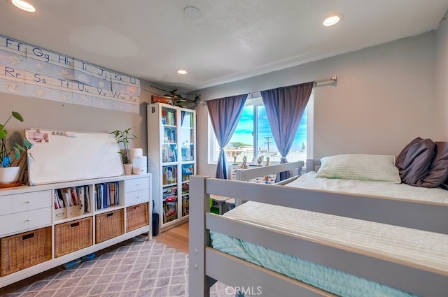 bedroom featuring light wood-type flooring