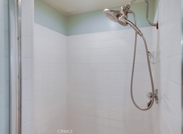 room details with a tile shower