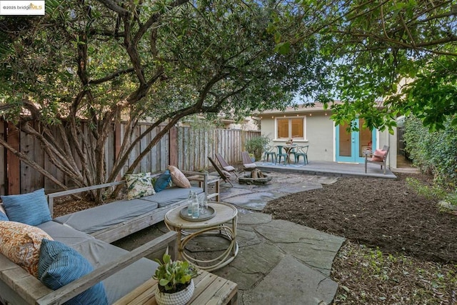 view of patio / terrace with french doors and outdoor lounge area