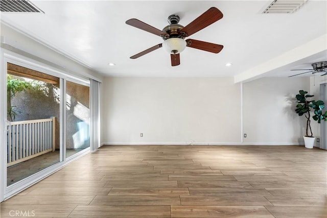 empty room featuring light hardwood / wood-style floors