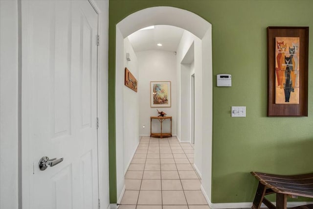 hallway featuring light tile patterned floors