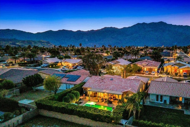 drone / aerial view featuring a mountain view