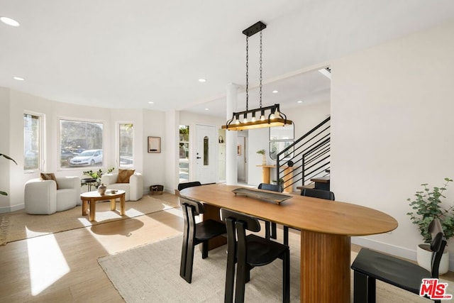 dining area with light wood-type flooring