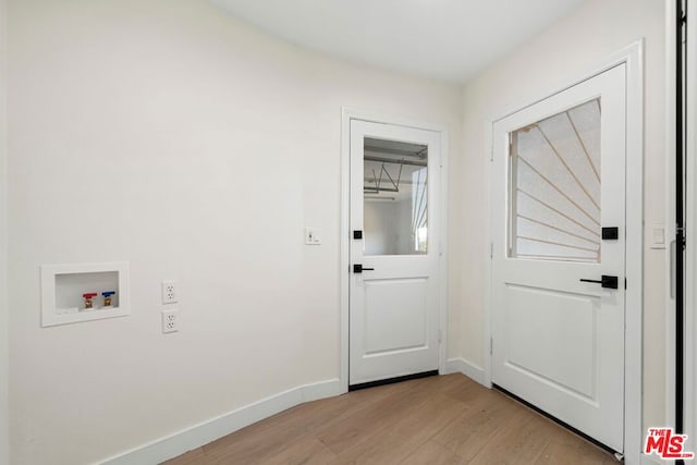 entryway with light hardwood / wood-style flooring