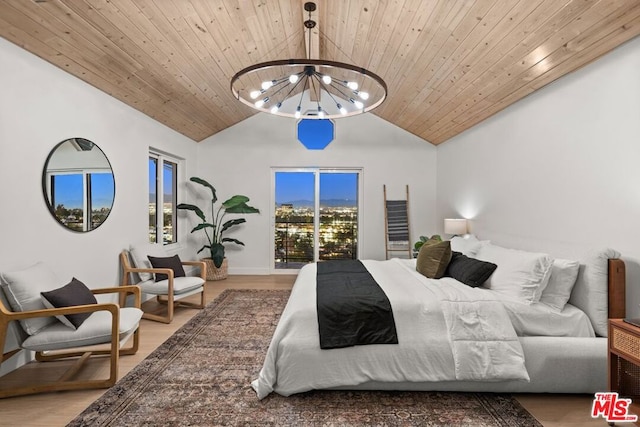 bedroom with wood ceiling, hardwood / wood-style floors, vaulted ceiling, and a chandelier