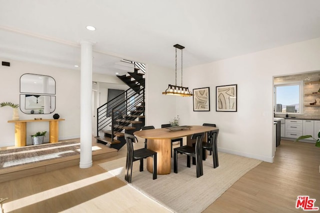 dining space featuring light hardwood / wood-style flooring