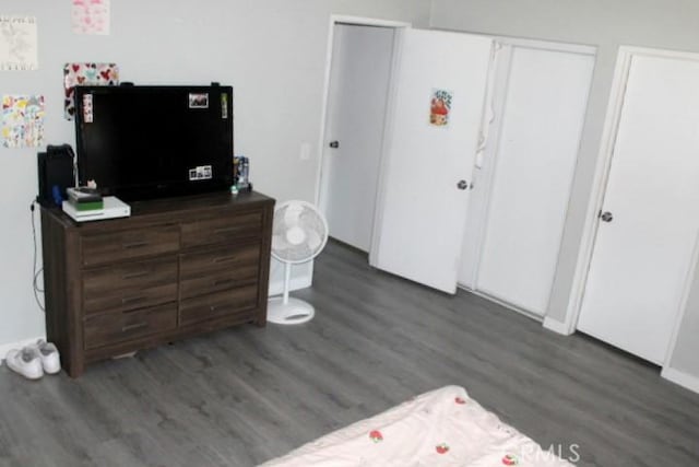 bedroom featuring dark hardwood / wood-style floors