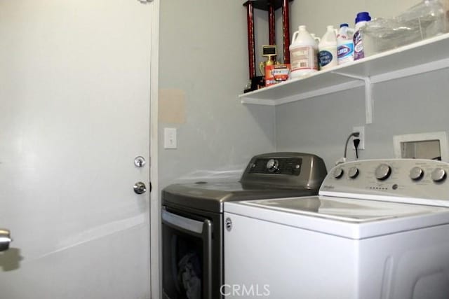 laundry area featuring independent washer and dryer