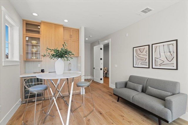 office area with light hardwood / wood-style floors