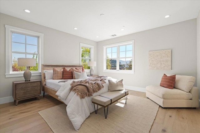 bedroom with light wood-type flooring