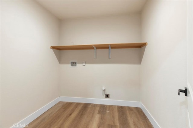 laundry area featuring washer hookup, hardwood / wood-style floors, and electric dryer hookup