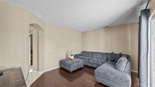 living room with wood-type flooring