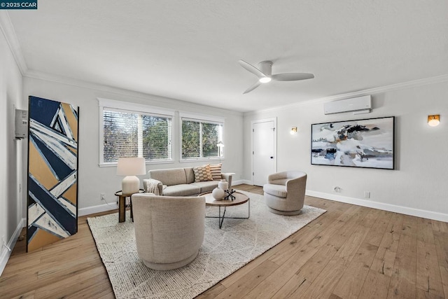 living room featuring a wall mounted AC, ceiling fan, ornamental molding, and light hardwood / wood-style floors