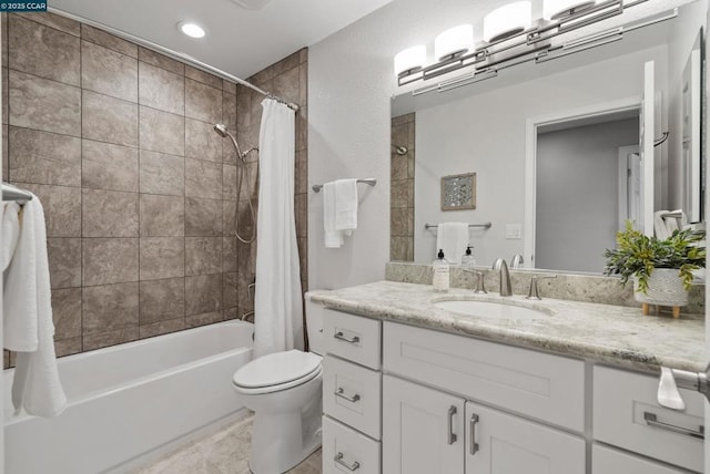 full bathroom with toilet, shower / tub combo with curtain, and vanity