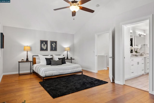 bedroom featuring ensuite bathroom, high vaulted ceiling, ceiling fan, and light hardwood / wood-style floors