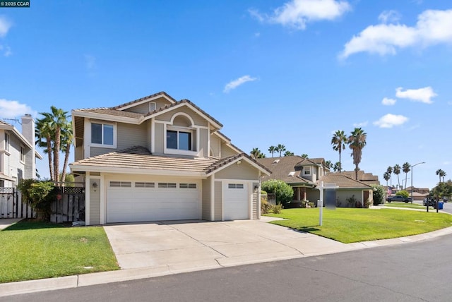 front of property with a front lawn and a garage