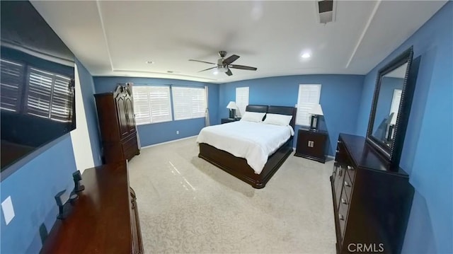 bedroom with light colored carpet and ceiling fan