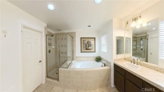 bathroom with vanity and plus walk in shower