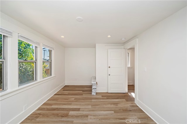 unfurnished room featuring light wood-type flooring