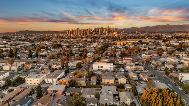 aerial view at dusk with a mountain view