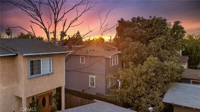 view of property exterior at dusk