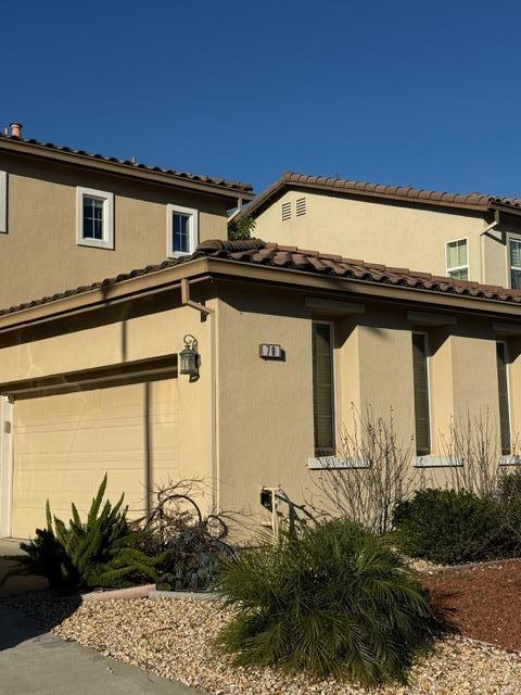 exterior space with a garage