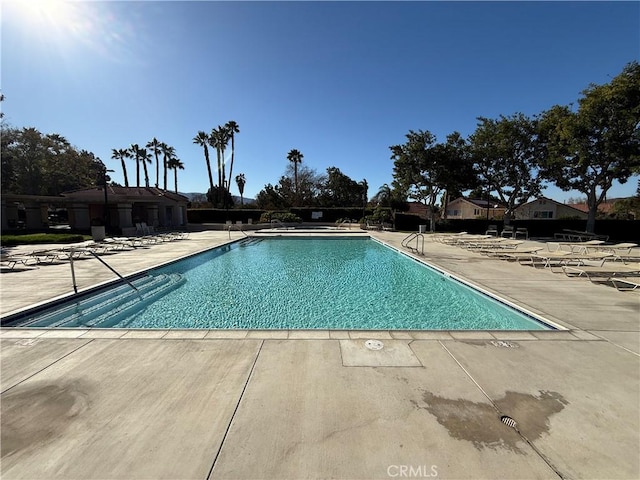 pool with a patio area