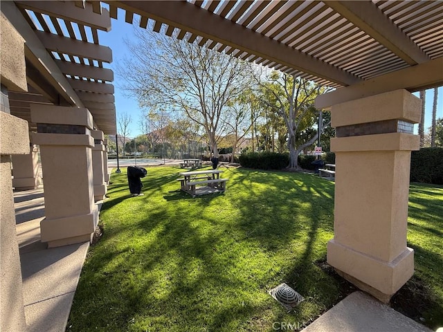 view of yard with a pergola