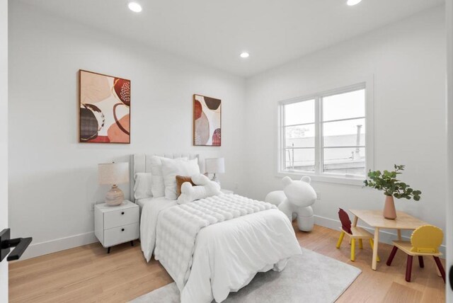 bedroom featuring light hardwood / wood-style floors